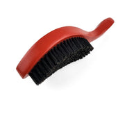 Une brosse à 360 waves medium en nylon et poils de sanglier pour les cheveux afro